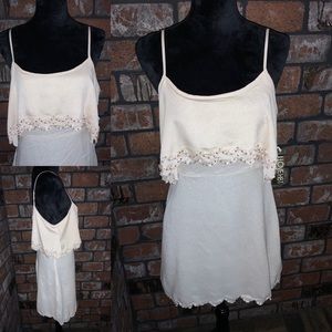 Spaghetti strapped dress with sequins in blush.